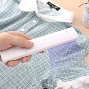 Portable hand-held ultraviolet germicidal lamp